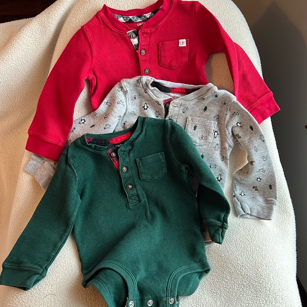 Three Carter long sleeve onesies